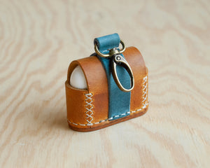 Ravenweave leather AirPods case back and texture detail