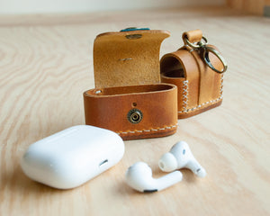 Leather AirPods case hand-stitched edge detail, Ravenweave