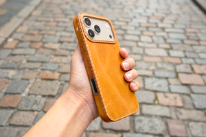 Handmade Honey leather iPhone case flat lay, Ravenweave studio