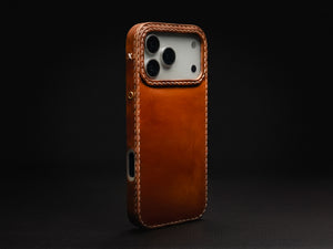Ember leather iPhone case with MagSafe alignment, hand-stitched by Ravenweave